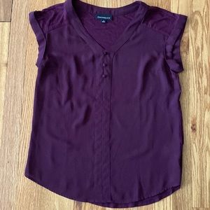 Plum colored blouse with faux buttons